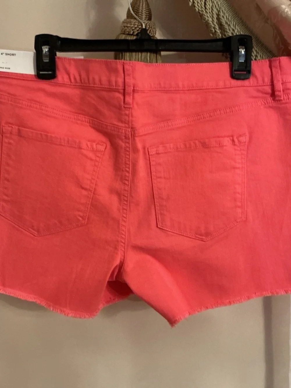 Loft 4” women”s shorts mid rise 98% cotton, 2% spandex. Size 10, coral color.